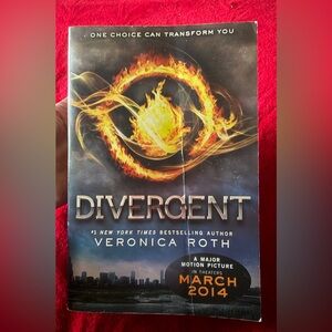 Divergent Paperback no rips writing or tears Pages R great but outside has wear